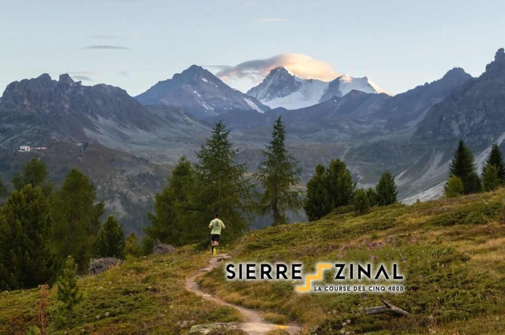 A man is running during the famous Sierre-Zinal mountain race, an event sponsorized by Audacia.